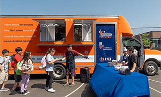 Van Stage Trucks in Education, Charity, and Community Outreach